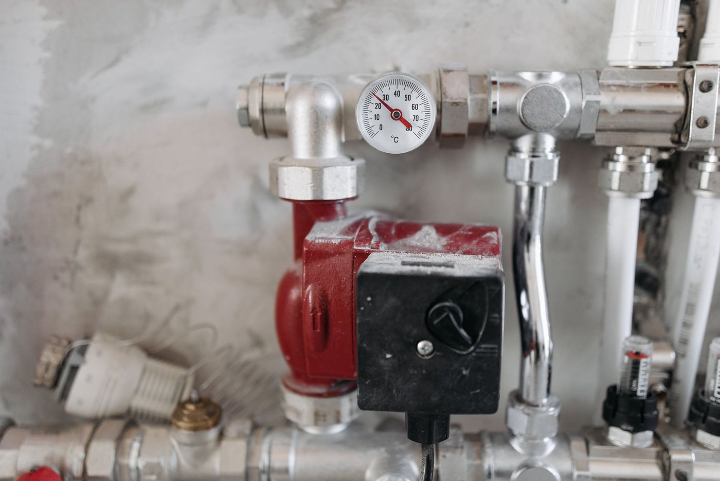 Pipework manifold with pressure gauge and isolation valve